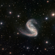Illustration for article titled The Meathook galaxy has been torn apart by a supernova